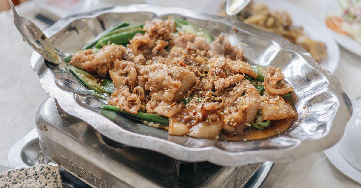 Stir-Fried Artemisia with Cured Meat (藜蒿炒腊肉)